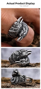 Close-up of vintage crow heads ring with detailed feather texture and silver finish