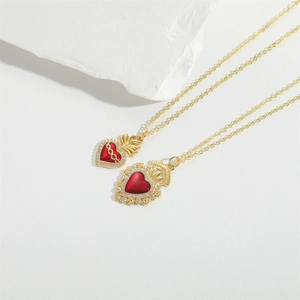 Vintage golden heart pendant necklace with red enamel and white zircon accents
