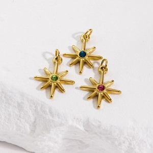Eight-pointed star pendants in gold stainless steel with blue, green and red gemstones