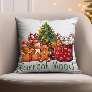 Housse de coussin de Noël en lin avec motif de pain d'épices sur canapé beige