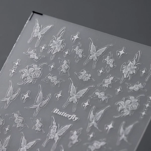 3D embossed butterfly and rose nail art stickers with white 5D textured floral patterns