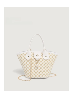 Detail of white bucket bag with yellow vintage pattern, pearl pendant and gold chain