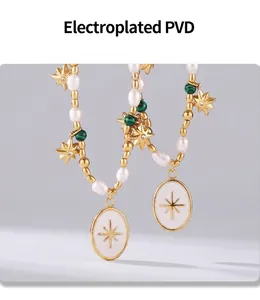 Detail of PVD plated star pendant necklace with freshwater pearls and green stone beads