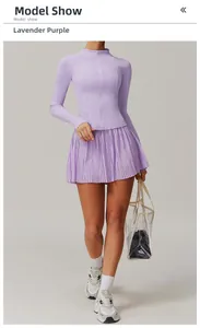 Detail of lavender purple long sleeve zip-up top and pleated sports skirt set