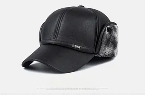 Close-up of winter PU leather baseball cap with grey faux fur ear flaps and metal BEST logo