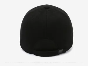 Rear view of black winter baseball cap with adjustable strap and textured wool fabric