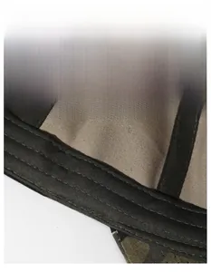 Macro view of wide sweatband and stitching inside the camouflage baseball cap