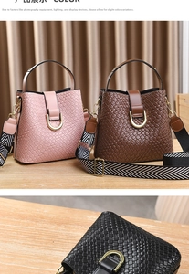 Detailed close-up of woven texture bucket bags in pink, brown, and black with metal buckle