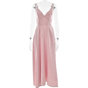 Pink satin V-neck maxi dress with backless design on mannequin against white backdrop