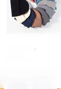 Flat lay of ribbed knit beanies in multiple colors including black, beige, and blue