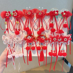 Traditional red Chinese New Year hair clips set for girls with tassels and pom-poms