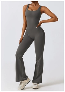 Close-up of sleeveless slim-fit yoga bodysuit with stylish flared pants in dark grey