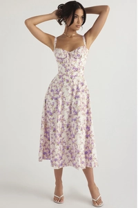 Detail view of the elegant floral spaghetti strap dress with corset bodice and purple flowers