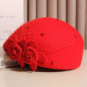 Elegant red wool beret with floral rose decoration and mesh veil for women winter
