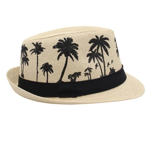 Detailed macro view of woven straw texture and tropical palm tree pattern on sun hat