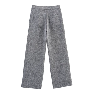 Detailed back view of grey tweed straight-leg trousers with two square patch pockets
