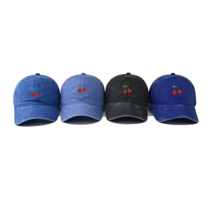 Vintage washed cotton baseball caps with cherry embroidery in four different blue colors