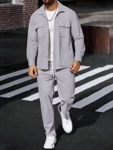 Detail of men's casual waffle texture two-piece set featuring shirt collar and pockets