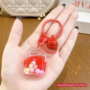 Cute red backpack keychain with liquid quicksand and colorful beads for school bags