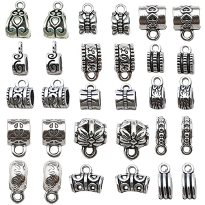 Macro di ganci e connettori per pendenti in argento per la creazione di gioielli fai da te