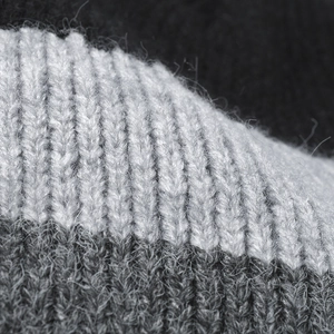 Winter rib knit beanie with stylish black and grey striped patterns for warmth