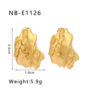 Detailed view of 18K gold plated stainless steel earrings with irregular lava texture