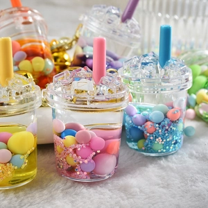 Glittering quicksand bottle keychain with mini boba tea cup design and colorful liquid