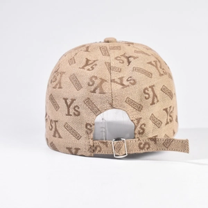 Detail view of the baseball cap back featuring a metal buckle and all-over Ys print