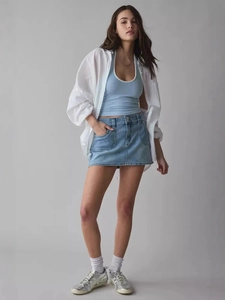 Slim fit high waist light blue denim mini skirt with double buttons and crop top outfit