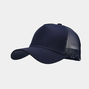 Detail of navy blue trucker hat featuring breathable mesh back and curved brim
