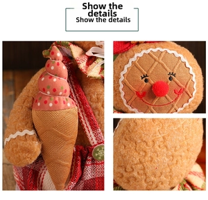 Detail of gingerbread man doll with waffle texture fabric and embroidery details