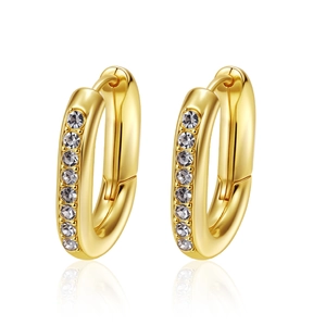 Macro detail of gold hoop earrings with silver-grey rhinestones on a white background