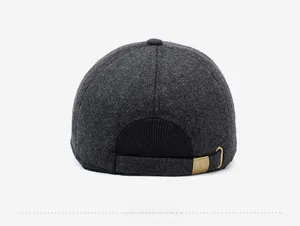Detail of wool blend baseball cap back featuring a vintage metal adjustable buckle