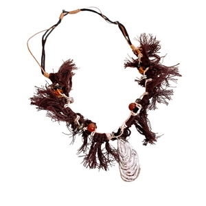Bohemian woven rope necklace with brown fringe, colorful beads and silver shell pendant