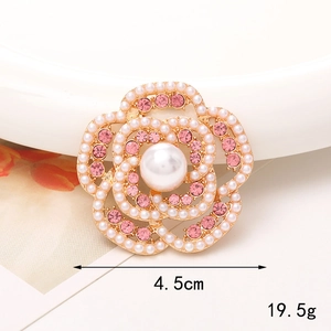 Accessoire tournesol DIY avec strass roses et perles blanches sur base en métal doré