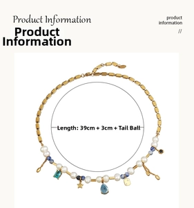 Detail of French vintage necklace with freshwater pearls and colorful gemstones charms