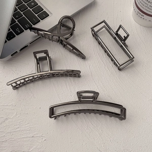 Set of 4 minimalist gunmetal grey metal hair claws including large shark clips and small arcs