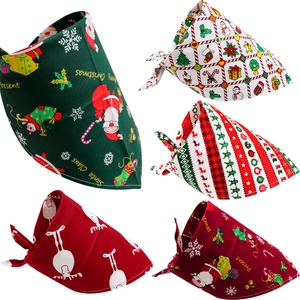 Five assorted Christmas cotton pet bandanas with festive Santa and reindeer patterns