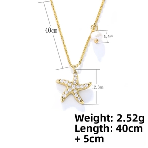 Detail view of starfish necklace with pave diamonds, 5.4mm pearl and dimensions