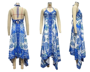 Detail of bohemian blue and white floral halter dress with open back and tie-up design