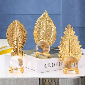 Set of 3 gold metal leaf sculptures with crystal ball bases for modern home decor