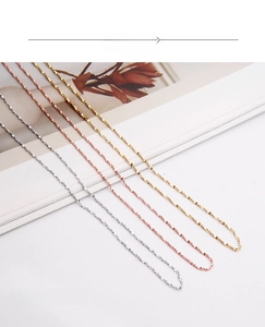 Close-up of S925 sterling silver star necklaces in gold, rose gold and silver finishes