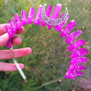 Detailed close-up of pink crystal crown with silver moon filigree and wire-wrapped stones