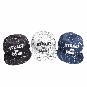 Detailed view of three snapback hats with marble pattern and STEADY embroidery