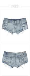 Pantaloncini di jeans a vita bassa con dettagli strappati e orli a frange grezze