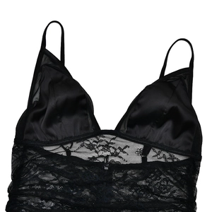 Close-up of black satin and lace bodice with V-neck and delicate spaghetti straps