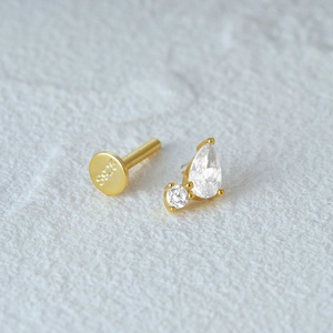 Macro shot of S925 sterling silver star earring with zirconia and screw flat back