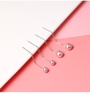 Detailed comparison of freshwater pearl sizes on long silver drop earring chains