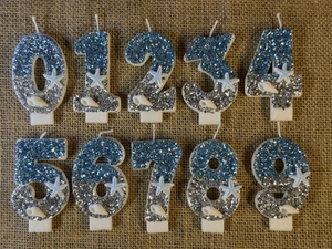 Blue and silver glitter ocean themed number 0-9 birthday candles with starfish detail