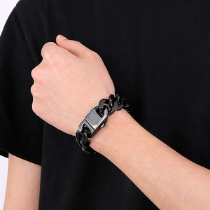 Close-up of 20mm polished black stainless steel chain bracelet with rectangular buckle